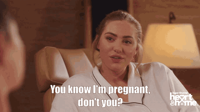 a woman is talking to a man and says " you know i 'm pregnant "