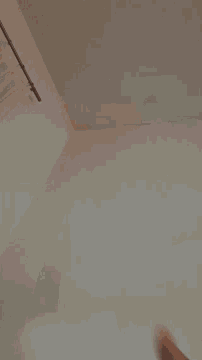 a close up of a person 's hand giving the thumbs up sign