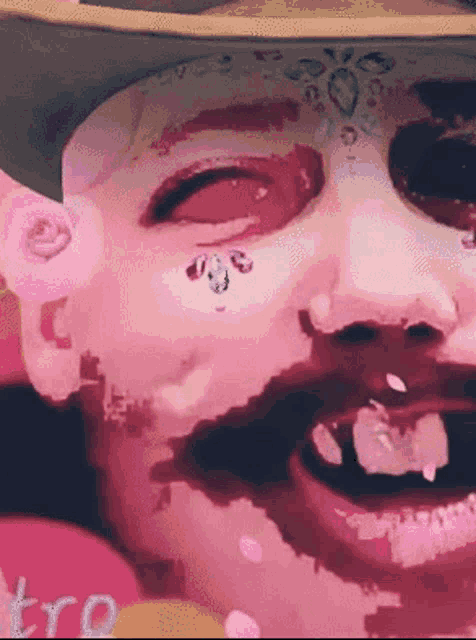 a close up of a person 's face with the word tr on the bottom left