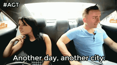 a man and a woman in a car with the words another day another city on the bottom