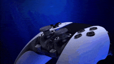 a close up of a video game controller against a dark blue background