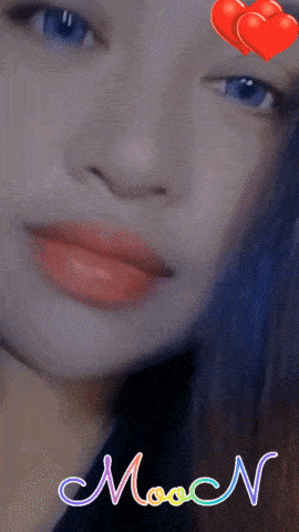 a close up of a woman 's face with the word moon in the corner
