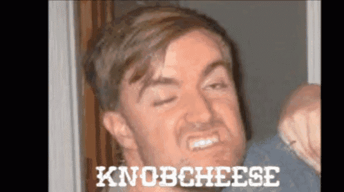 a man is making a funny face with the words knobcheese written above him