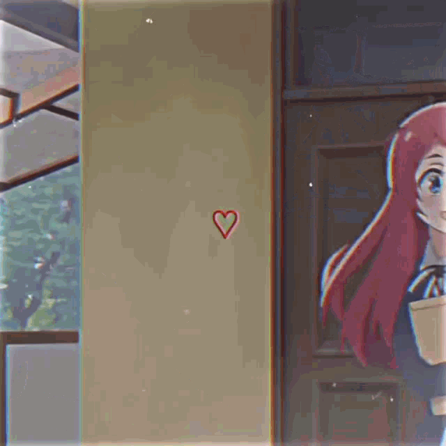 a girl with red hair and blue eyes is standing in front of a window and smiling .