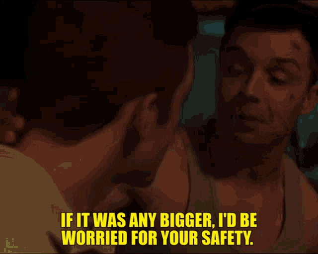 a man talking to another man with the words " if it was any bigger i 'd be worried for your safety "