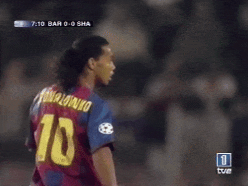 a soccer game between bar and sha is being shown