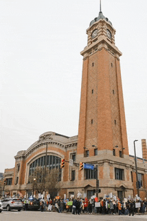 a large brick building with a clock tower