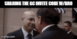 a man in a suit and tie is shaking hands with another man in a suit and tie .