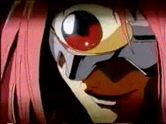 a close up of a person 's face with a large red eye .