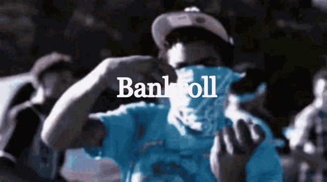 a man covering his face with a bandana with the word bankroll written above him