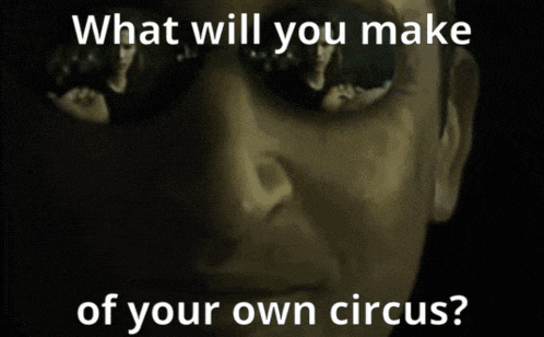a person holding a red pill and a blue pill in their hands with the words " what will you make of your own circus "
