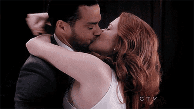 a man and a woman are kissing with the letters ctv in the background