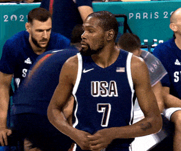 a basketball player wearing a jersey that says usa on it