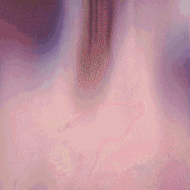 a close up of a person 's face with a purple and pink background