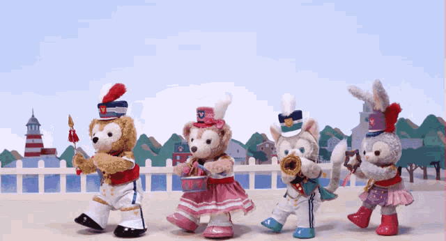 a group of stuffed animals are playing instruments and one of them has a letter w on their hat