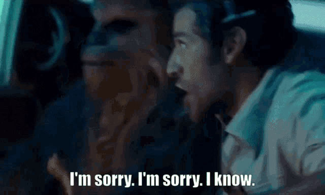 a man in a car says i 'm sorry i 'm sorry i know