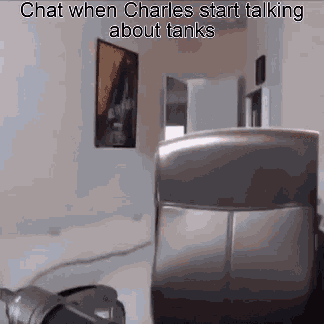 a video of a person talking about tanks with a caption that reads chat when charles start talking about tanks