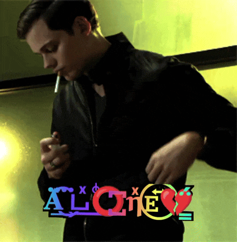 a man is smoking a cigarette and the word alone is above him