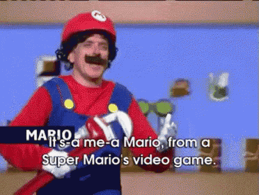 a man dressed as mario says it 's a me - a mario from a super mario 's video game