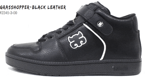 a pair of black leather shoes with a white g on the side