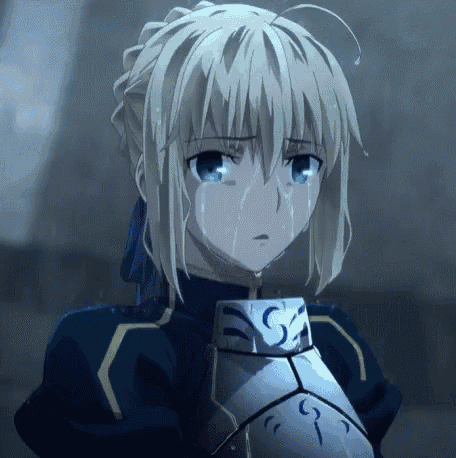 a girl with blonde hair and blue eyes is crying .
