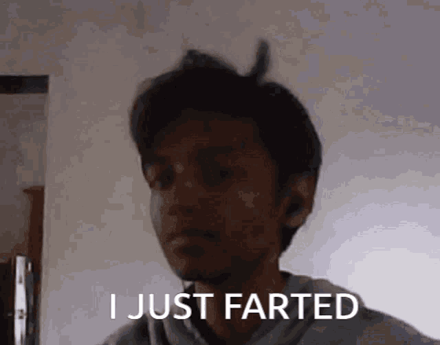 a man is making a funny face and saying i just farted .