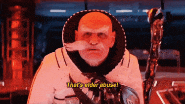 a man in a space suit says that 's elder abuse while holding a sword