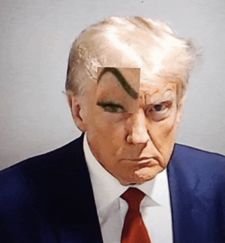 a close up of donald trump 's face with his eyebrow visible