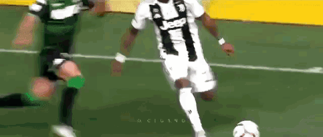 a man in a jeep jersey is kicking a soccer ball .