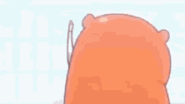 a close up of a cartoon character wearing an orange hooded sweater .