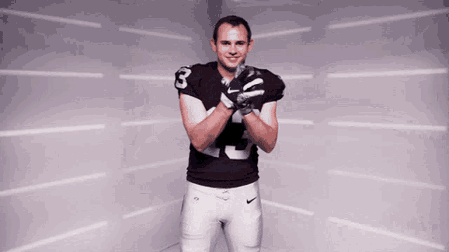 a football player wearing a number 3 jersey