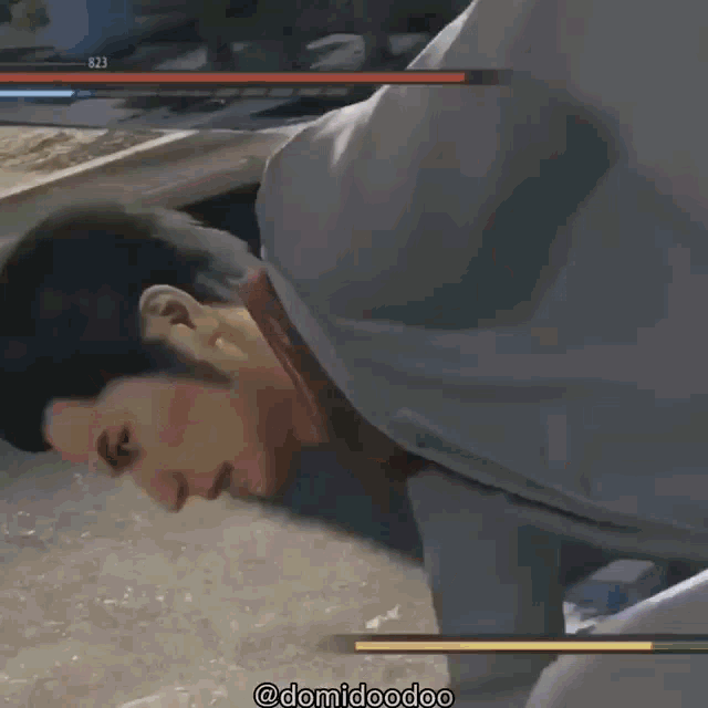 a man is kneeling down in a video game with the hashtag @domidoodoo on the bottom