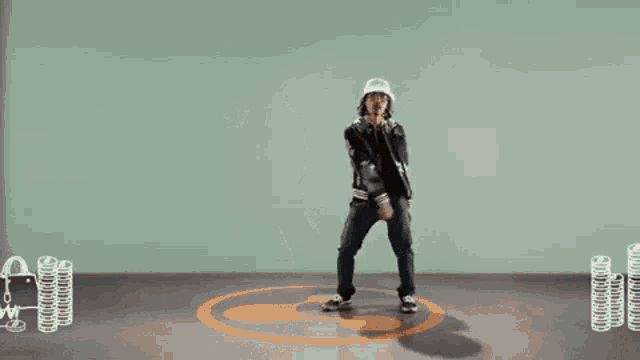 a man is standing in a room with bubbles coming out of his hand
