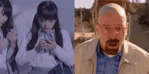 a girl is looking at her phone next to a man with a beard and glasses .