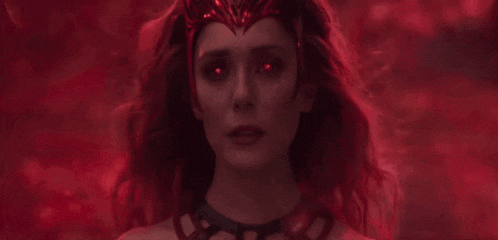 scarlet witch is a superhero with red eyes and a crown on her head .
