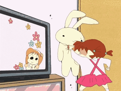 a girl in a pink dress is standing next to a stuffed bunny