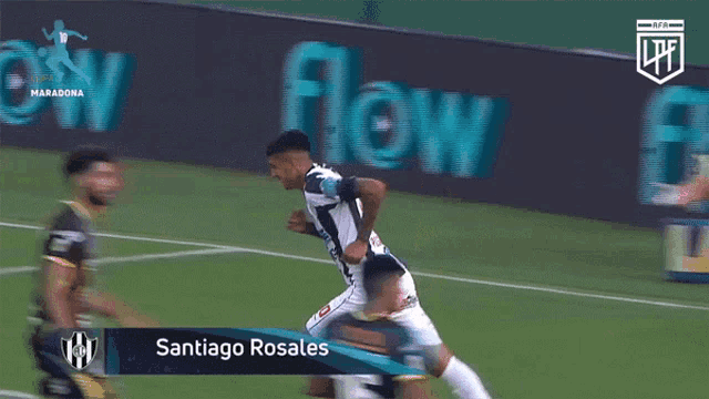 a soccer player named santiago rosales runs on the field