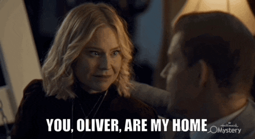 a man and a woman are looking at each other and the woman says you oliver are my home