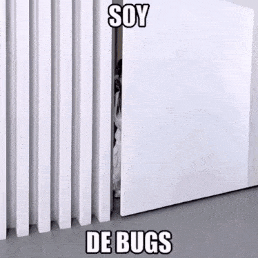 a person is peeking out from behind a white door with a meme .