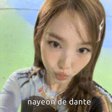 a close up of a woman 's face with the words `` nayeon de dante '' written on it .