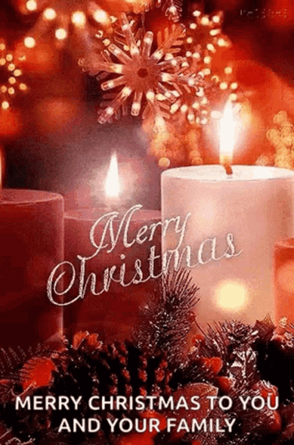 a merry christmas to you and your family greeting card with two lit candles