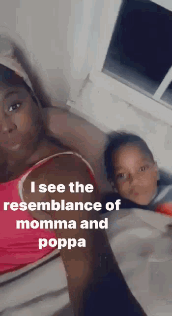 a woman laying next to a child with the words " i see the resemblance of momma and poppa " below her