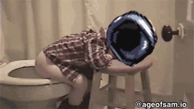 a person sitting on a stool in front of a toilet with ageofsam.io on the bottom