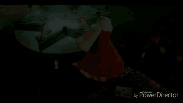 a woman in a red and white dress is dancing in front of a star shaped fountain ..