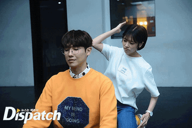 a man wearing a sweatshirt that says my mind is going