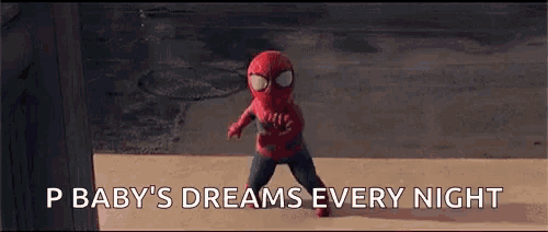 a baby dressed in a spiderman costume is running down a sidewalk with the words p baby 's dreams every night above him