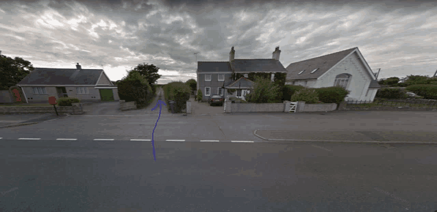 a blue arrow points the way to a house on the right