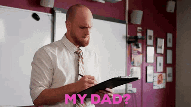 a man in a white shirt and tie is holding a clipboard and writing on it with the words my dad below him