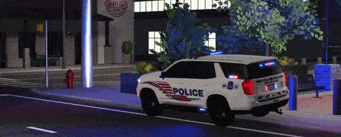 a white police suv is parked on the side of the road