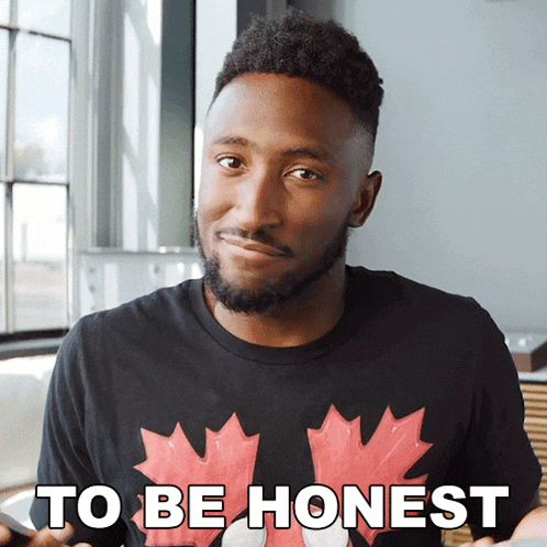 a man wearing a black t-shirt with a maple leaf on it says to be honest